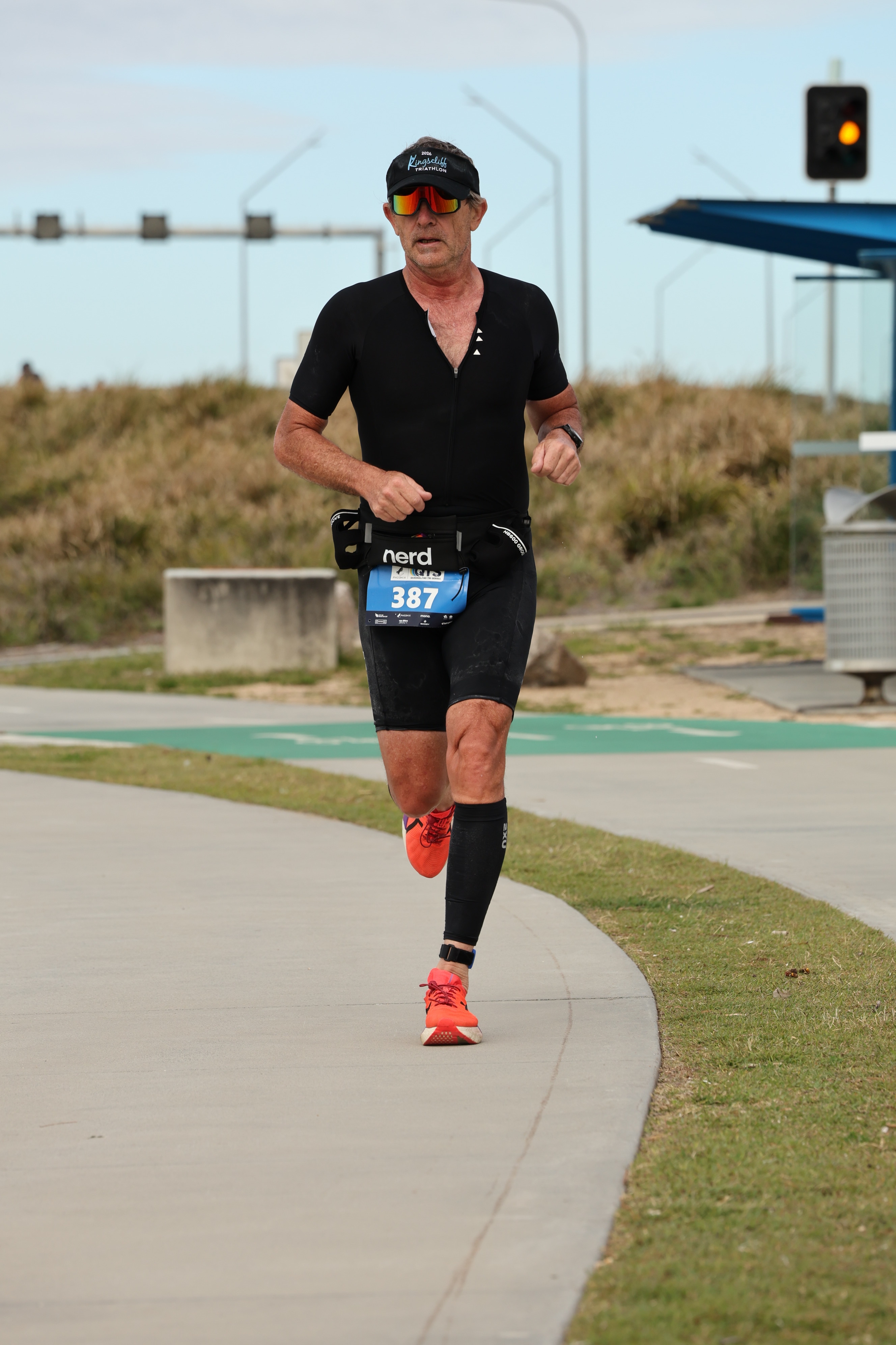 Des Trindall competing in a triathlon — still racing after 40+ years